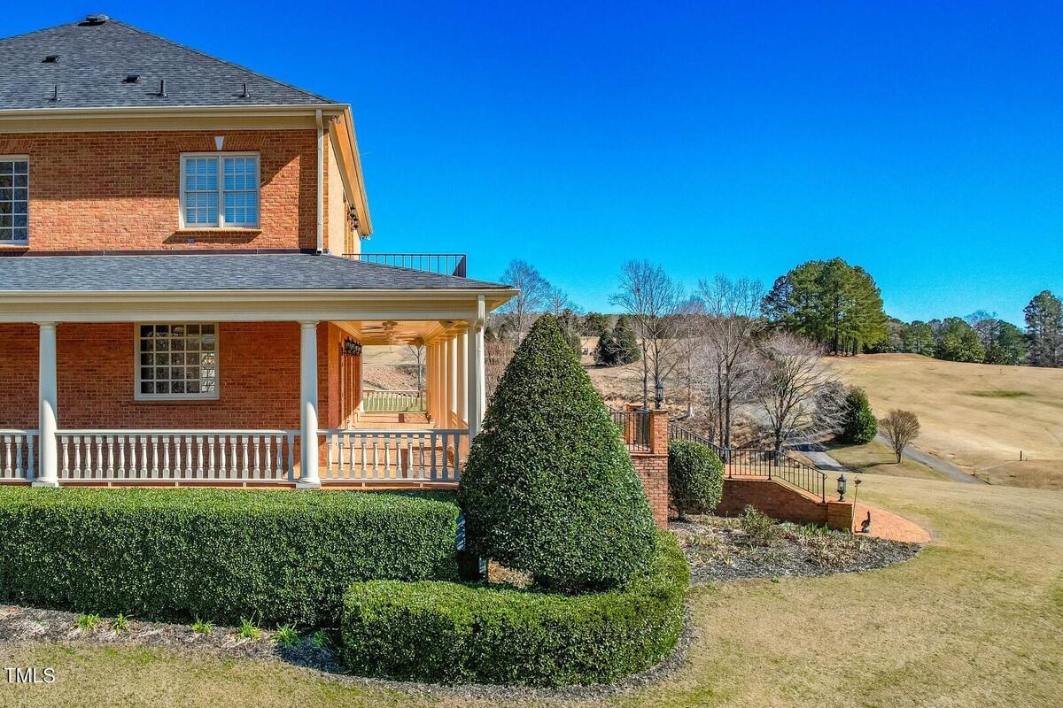 Explore This Luxurious Estate in Golf Course Community with River Views